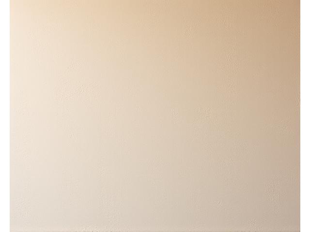 Fertiger Lehmputz auf einer Wand mit natürlicher Textur.